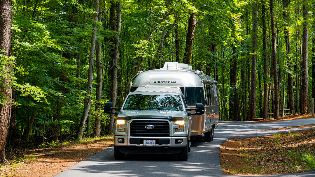 Half-ton pickup towing an Airstream trailer with RoadActive Suspension to reduce bounce and porpoising